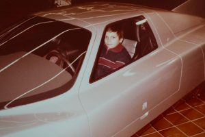 Marcel Hasübert in einem Mercedes C111